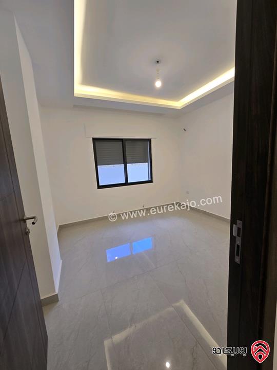 شقة أرضية مساحة 115م مع تراسات 90م للبيع في عمان - تلاع العلي