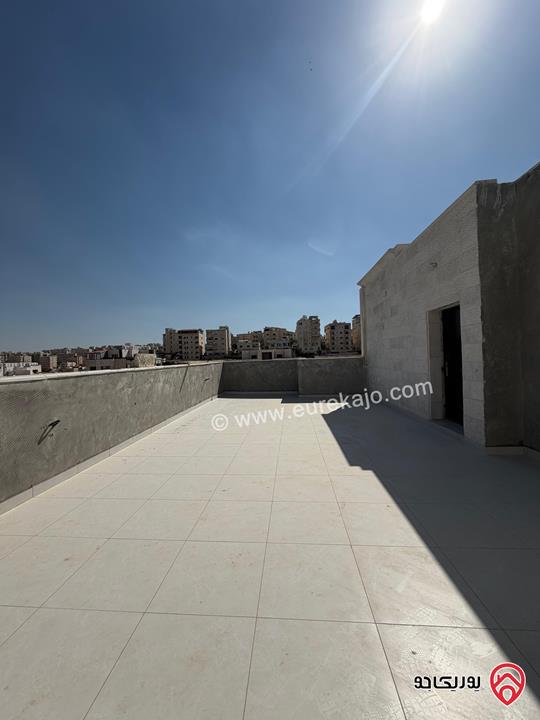 شقة طابق ثالث مع رووف مساحة 170م وترس 80م سوبر ديلوكس للبيع في عمان -  الجبيهة 