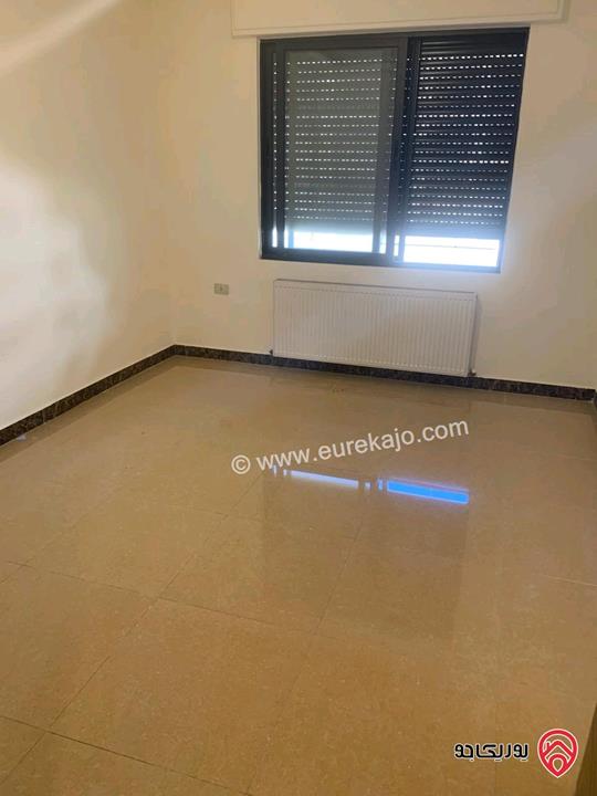 شقة فارغة شبه ارضية مساحة 160م للايجار في عمان - تلاع العلي 