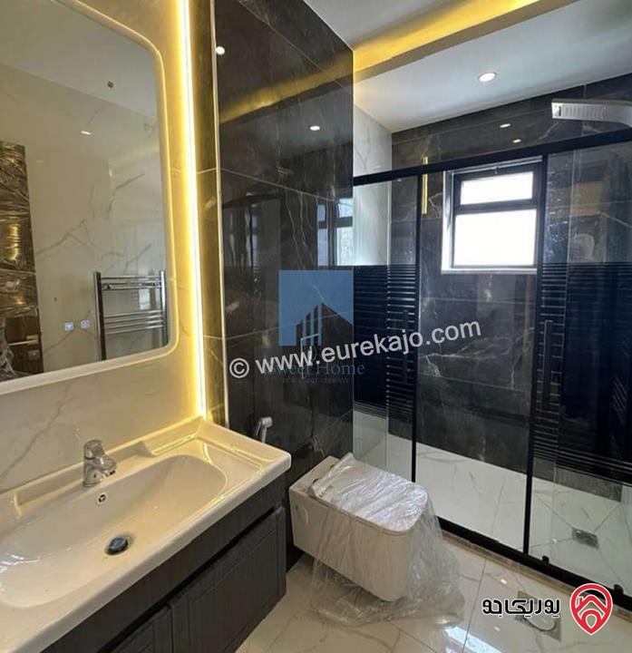 شقة أرضية فاخرة للبيع في عمان - تلاع العلي - خلف طواحين الهوا 180م مع ترس 40م لم تسكن