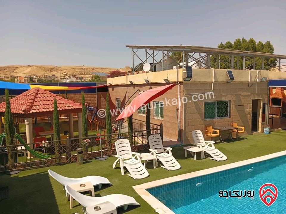 شاليه مساحة الأرض 560م وبناء 100م للبيع في الغور - جوفة الكفرين منطقة الشاليهات