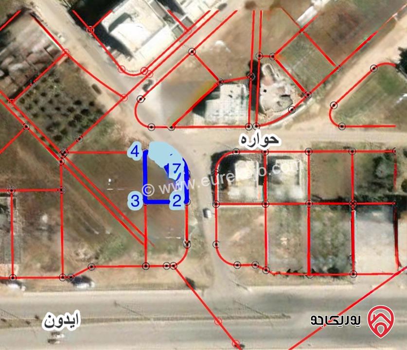 قطعة ارض مساحة 455 متر للبيع في اربد / حواره ، شارع البترا 