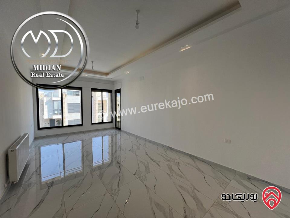 شقة ارضية جديدة للبيع في عمان - حي الصحابة مساحة 185م مع ترس و حديقة 150م تشطيبات ديكورات فاخرة و بسعر مميز