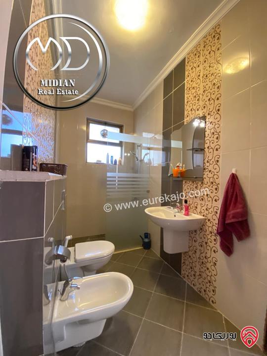 شقة شبه ارضي للبيع في عمان - خلدا العوجانية مساحة 200م مع تراسات و حدائق سوبر ديلوكس بسعر مميز