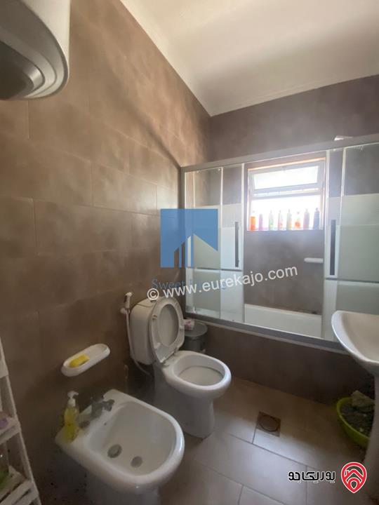 شقة أرضية مفروشة فاخرة للبيع في عمان - السابع قرب السفارة الرومانية 185م مع ترس امامي 25م تشطيب سوبر ديلوكس