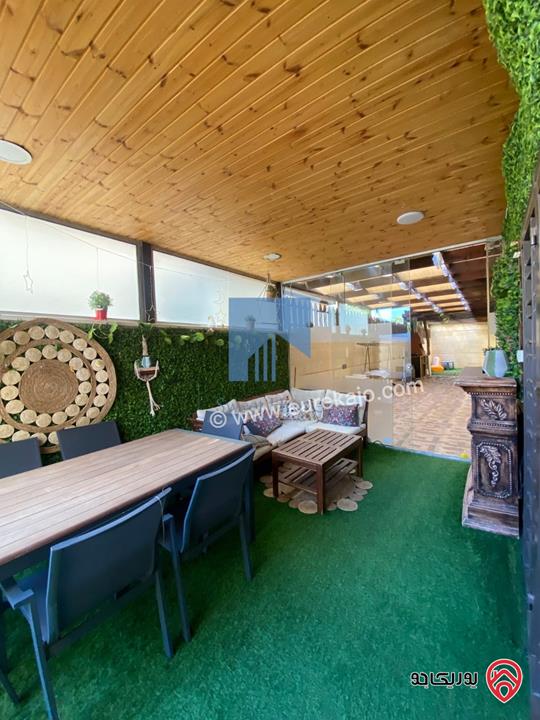 شقة أرضية مفروشة فاخرة للبيع في عمان - أم السماق مساحة 245م مع حديقة وترسات 120م