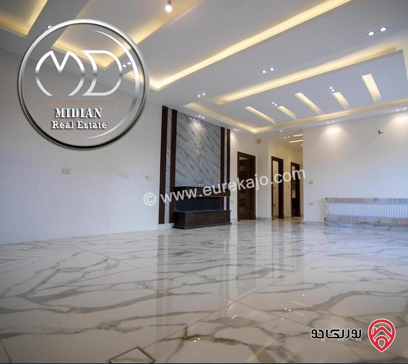 شقة شبه ارضي جديدة للبيع في عمان - تلاع العلي مساحة 185م مع ترس 50م تشطيبات سوبر ديلوكس بسعر مميز جداً