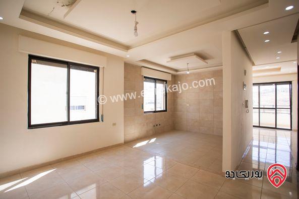 شقة طابق ثالث مع روف مبني مساحة 135م مع ترس 50م للبيع في عمان - ابو علندا كاش او اقساط 