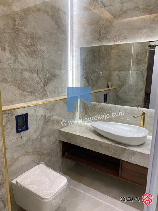 شقة أرضية فاخرة للبيع في عمان - أم أذينة قرب أبراج السادس 200م مع ترس 60م لم تسكن