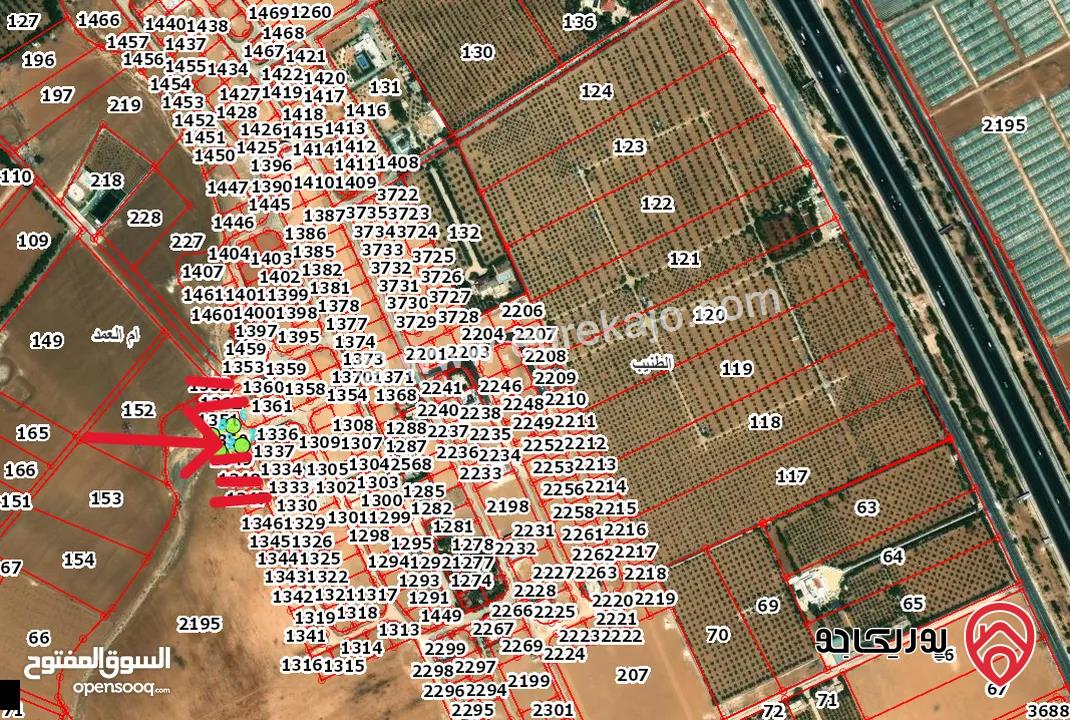قطعة ارض مساحة 498م للبيع من أراضي جنوب عمان - الطنيب واجهة على الشارع منطقة فلل ومطلة على جامعة الاسراء