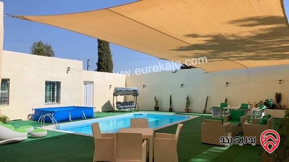 مزرعة مساحة الأرض 4 دونم والبناء 200م للبيع في البلقاء - منطقة تل الرمان 