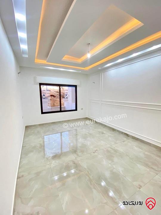 شقة ارضية مساحة 145م داخلي و 25م خارجي للبيع في عمان - ابو علندا اسكان الكهربا 