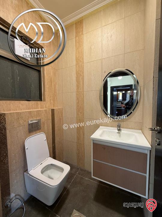 شقة ارضية للبيع في عمان - دير غبار مساحة 200م مع ترس 80م تشطيبات و ديكورات سوبر ديلوكس