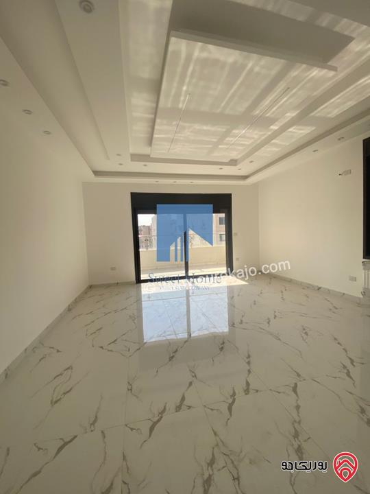 شقة فاخرة للبيع في عمان - خلدا قرب إشارة البنك العربي ومركز زها طابق ثاني 220م تشطيب سوبر ديلوكس لم تسكن