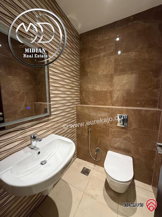 شقة شبه ارضي فارغة للايجار في عمان - خلدا العوجانية مساحة 250م 4 نوم مع تراسات و حدائق تشطيبات و ديكورات فاخرة