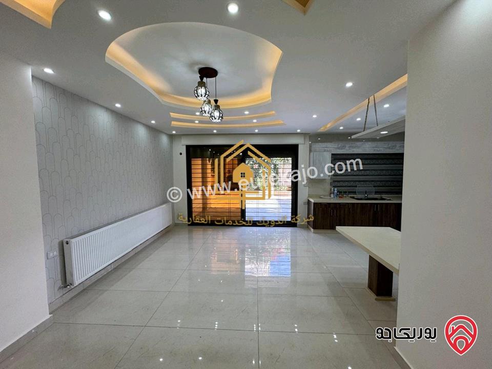 شقة سوبر ديلوكس طابق شبه ارضي مساحة 200م داخلي و 100م خارجي للايجار في عمان - طريق المطار 