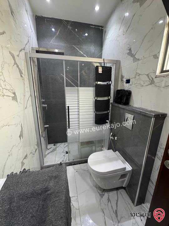 شقة مميزة طابق اخير مساحة 133م مع روف 49م للبيع في عمان - تلاع العلي