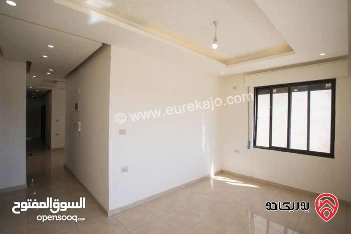 اخر شقة في المشروع طابق ثالث مع روف مبني مرخص مساحة 135م للبيع في عمان - ابو علندا 