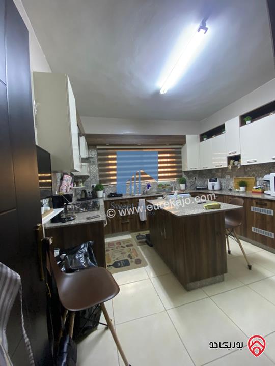 شقة مفروشة طابق ثاني 177م مع حديقة وترس 100م للبيع في عمان - تلاع العلي