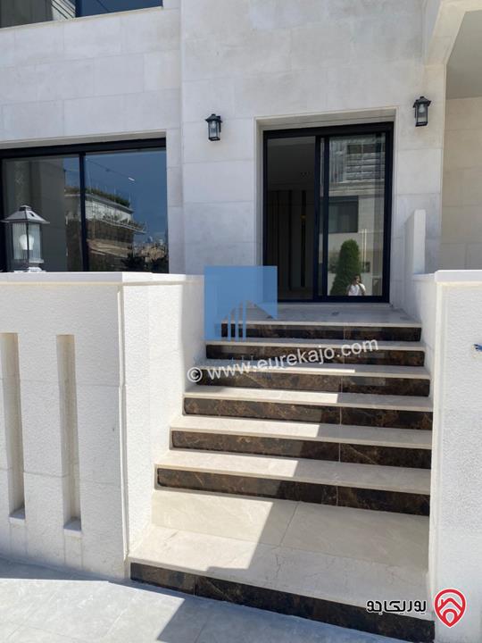 شقة أرضية فاخرة للبيع في عمان - أم أذينة قرب أبراج السادس 200م مع ترس 60م لم تسكن