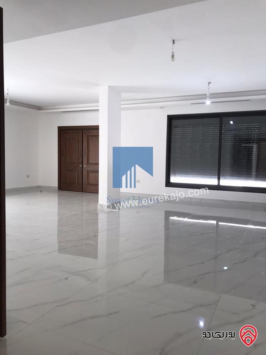 شقة فاخرة للبيع في عمان - خلدا قرب المدارس الإنجليزية 280م مع حديقة وترسات 320م لم تسكن