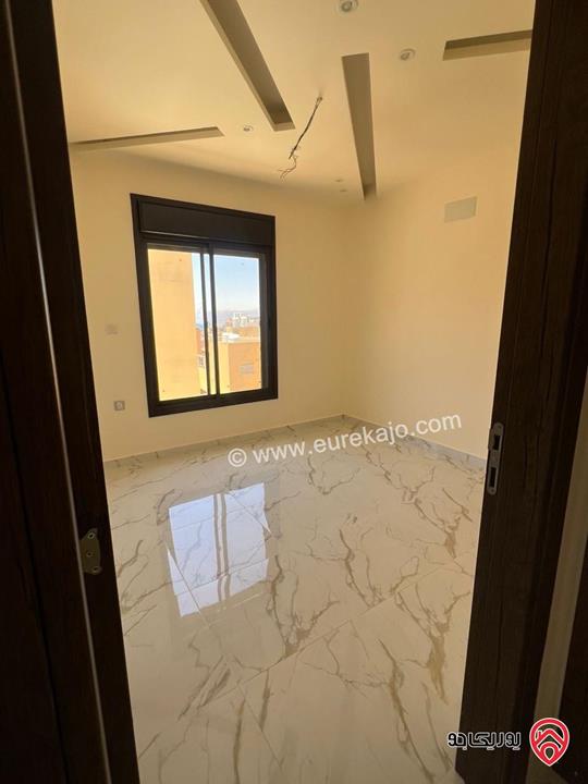 شقة طابق رووف مساحة 143م للبيع في العقبة - التاسعة