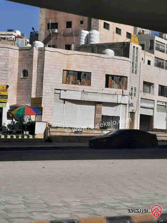 مجمع تجاري 5 محلات و3 شقق للبيع في عمان - ضاحية الياسمين شارع القدس