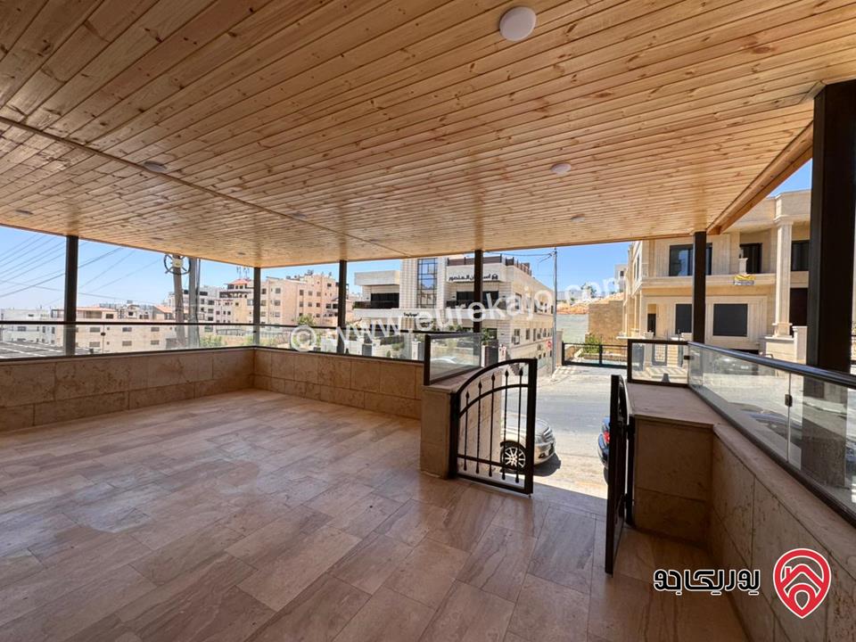شقة أرضية للبيع في عمان - خلدا مساحة البناء 200م و مساحة الترس 50م موقع مميز