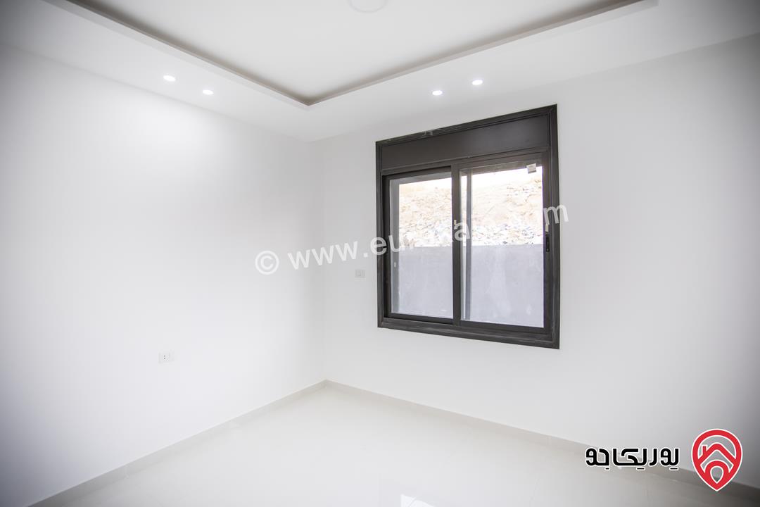 شقة طابق أرضي مساحة 120م للبيع في عمان - ابو علندا