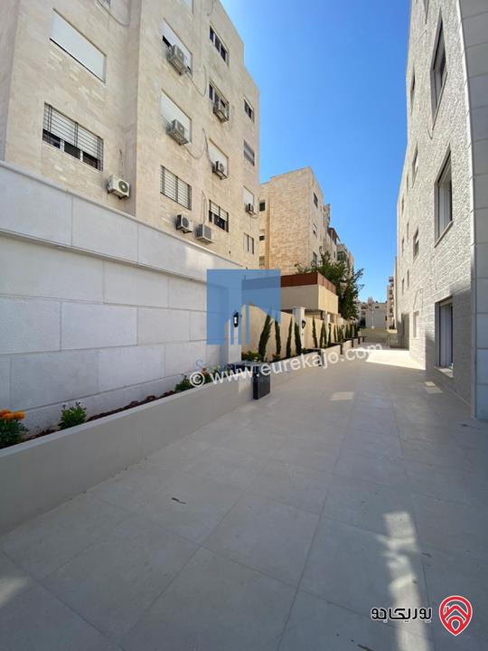 شقة أرضية فاخرة للبيع في عمان خلدا - قرب إشارة البنك العربي 175م مع ترسات 200م لم تسكن