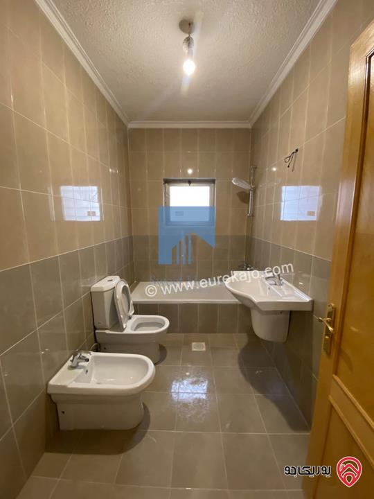 شقة أرضية (شبه فيلا) طابقية فاخرة للبيع في عمان - الرابية قرب الكالوتي 425م مع حديقة وترسات 500م