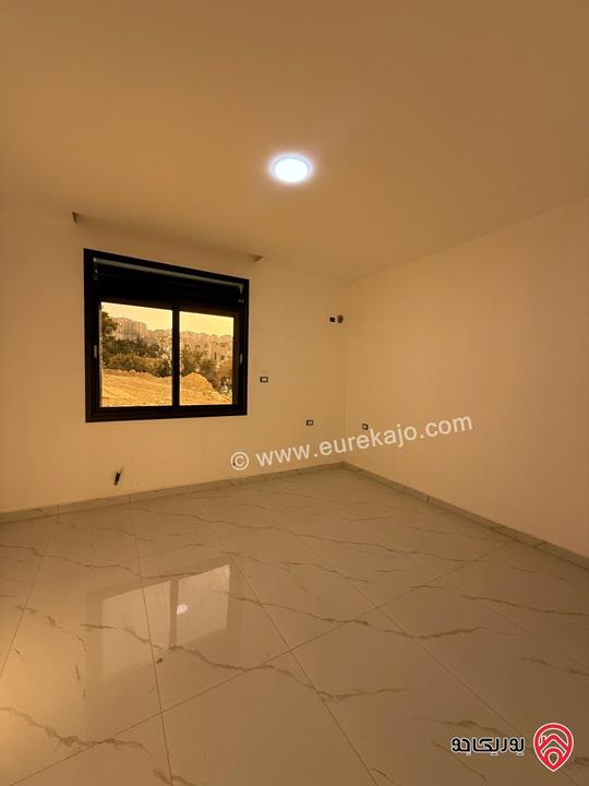 شقة أرضية ديلكوس مساحة 150م داخلي و 90م خارجي للبيع في عمان - الجبيهة الامام الغزالي