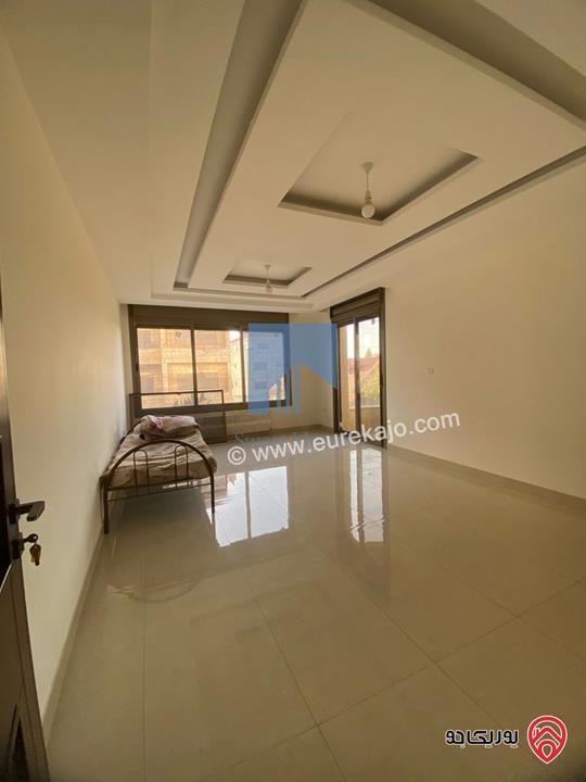 شقة فاخرة للبيع في عمان - أم أذينة قرب أبراج السادس طابق ثالث 180م مع روف دوبلكس 105م لم تسكن