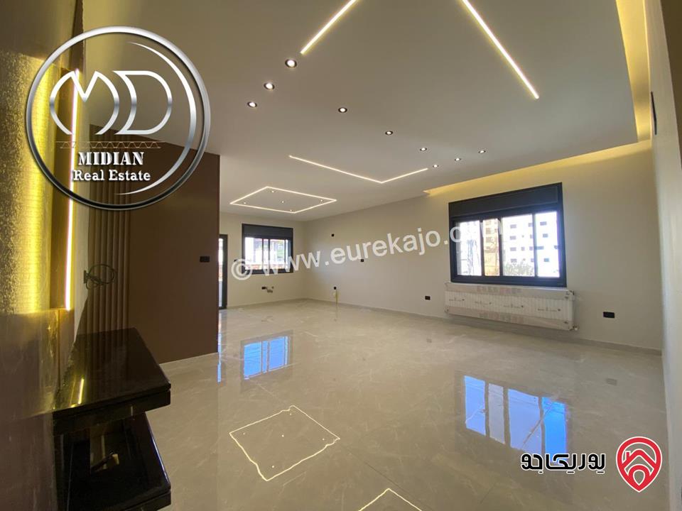 شقة ارضية جديدة للبيع في عمان - تلاع العلي مساحة 210م مع ترس و حديقة 140م تشطيبات ديكورات عصرية فاخرة بسعر مميز