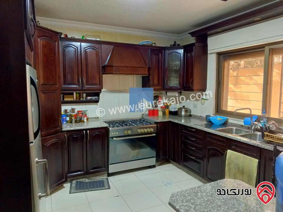 شقة أرضية مميزة مساحة 215م مع حديقة وترسات 120م للبيع في عمان - خلدا