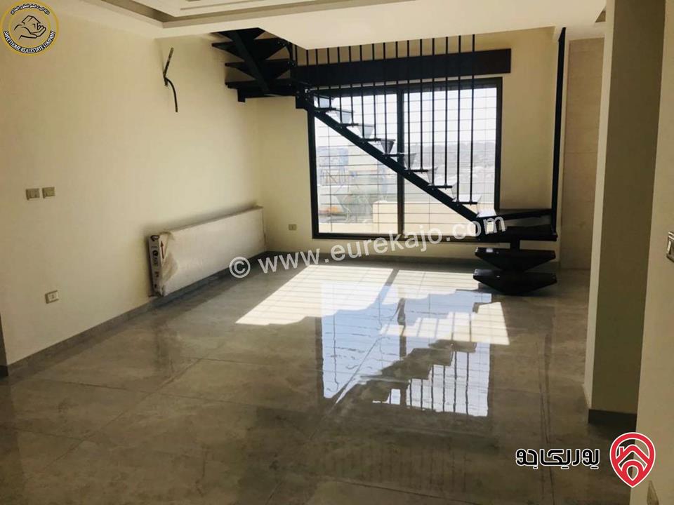 شقة فاخرة للبيع في عمان - خلدا - العوجانية قرب الهمشري طابق ثالث 200م مع روف دوبلكس 140م لم تسكن