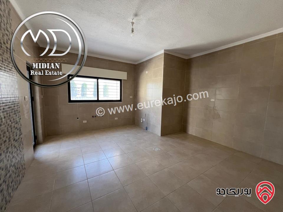 شقة شبه ارضي للبيع في عمان - ضاحية النخيل مساحة 190م مع ترس و حديقة 150م تشطيبات سوبر ديلوكس جديدة لم تسكن