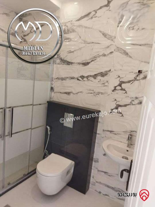 شقة أرضية مفروشة للايجار في عمان - طريق المطار مساحة 180م مع ترس 70م تشطيبات ديكورات فندقية فرش فاخر بسعر مميز