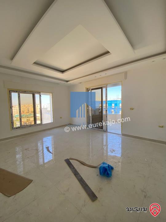 شقة فاخرة للبيع في عمان خلدا - قرب إشارة البنك العربي طابق اول 175م تشطيب سوبر ديلوكس لم تسكن