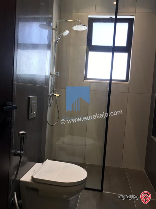 شقة طابقية فاخرة طابق اول مساحة 235م للبيع في عمان - الجندويل تشطيب سوبر ديلوكس لم تسكن