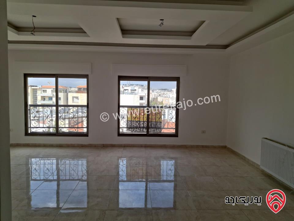 شقة جديدة طابق ثاني مساحة 174م للبيع في عمان - خلدا