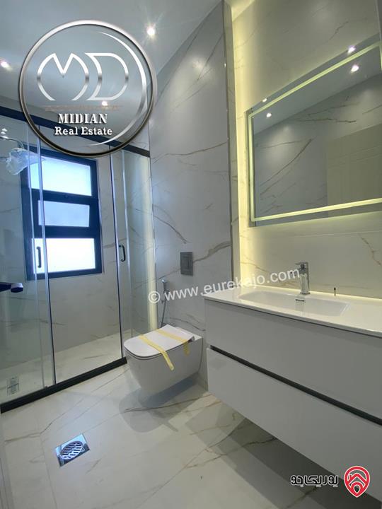 شقة دوبلكس جديدة طابق اخير مع روف للبيع في عمان - الجندويل مساحة 230م مع تراسات تشطيبات ديكورات عصرية اطلالة جميلة