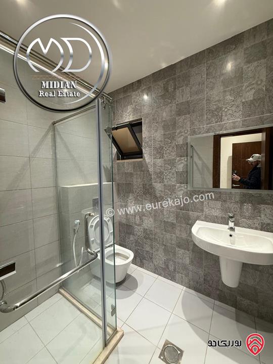 شقة شبه ارضي فارغة للايجار في عمان - خلدا العوجانية مساحة 250م 4 نوم مع تراسات و حدائق تشطيبات و ديكورات فاخرة