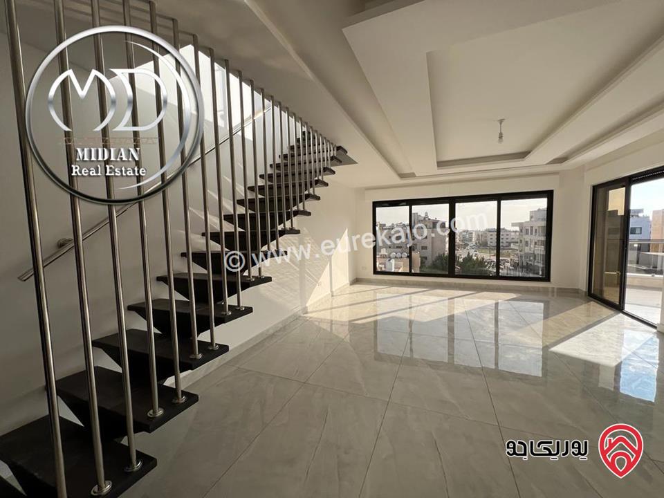 شقة دوبلكس جديدة للبيع في عمان - خلدا العوجانية طابق أخير مع روف مساحة 250م مع تراسات اطلالة رائعة بسعر مميز