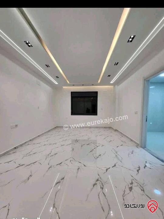 شقة طابق أول هندسي و رووف اطلالة بحرية مساحة 175 م² للبيع في العقبة - السكنية الخامسة تشطيب هايبر ديلوكس 