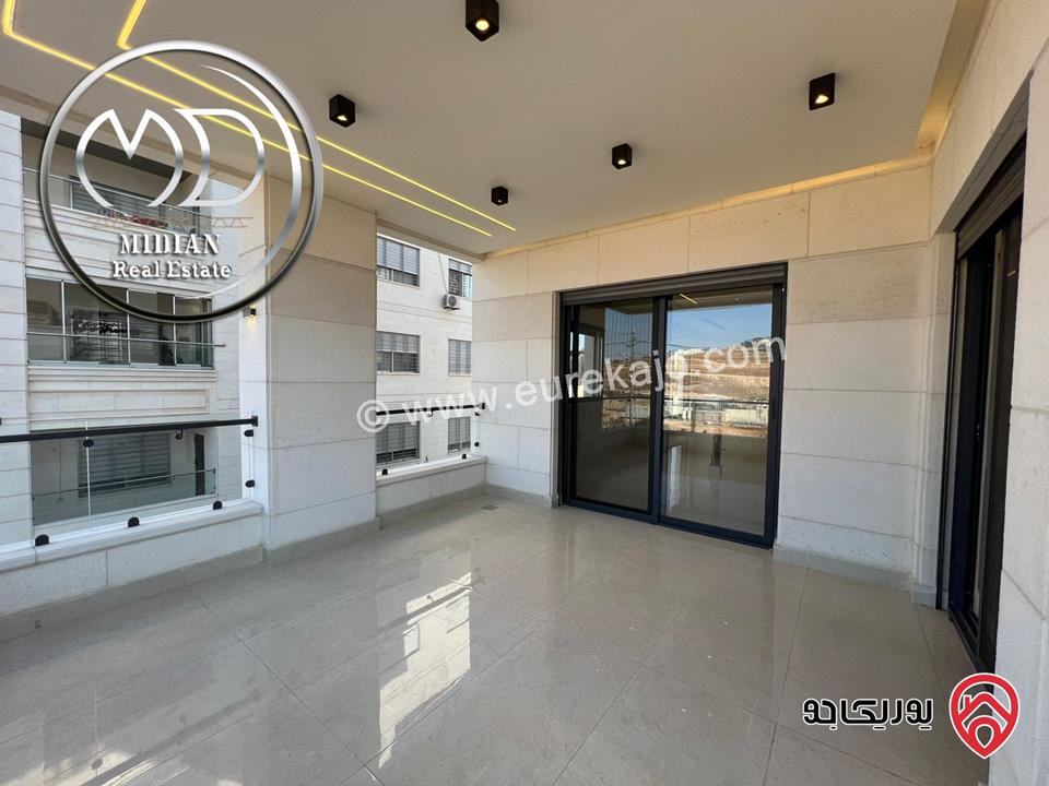 شقق فاخرة للبيع في عمان - ضاحية النخيل مساحات 225م تشطيبات وديكورات عصرية اطلالة جميلة جديدة لم تسكن