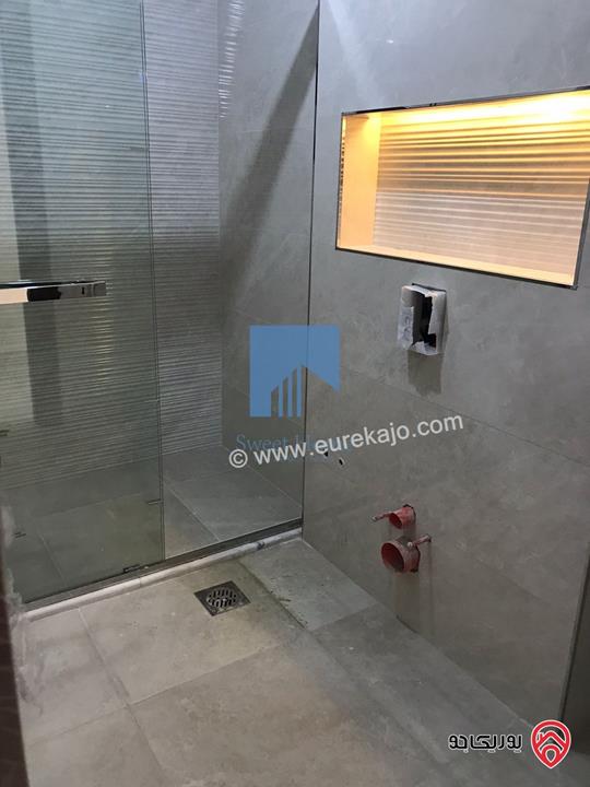 شقة فاخرة للبيع في عمان - خلدا قرب المدارس الإنجليزية 280م مع حديقة وترسات 320م لم تسكن