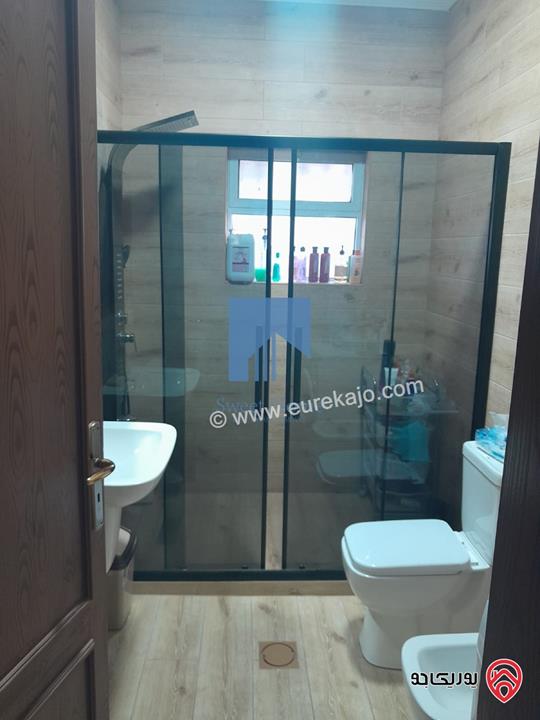 شقة أرضية مفروشة فاخرة للبيع في عمان - السابع قرب السفارة الرومانية 185م مع ترس امامي 25م تشطيب سوبر ديلوكس