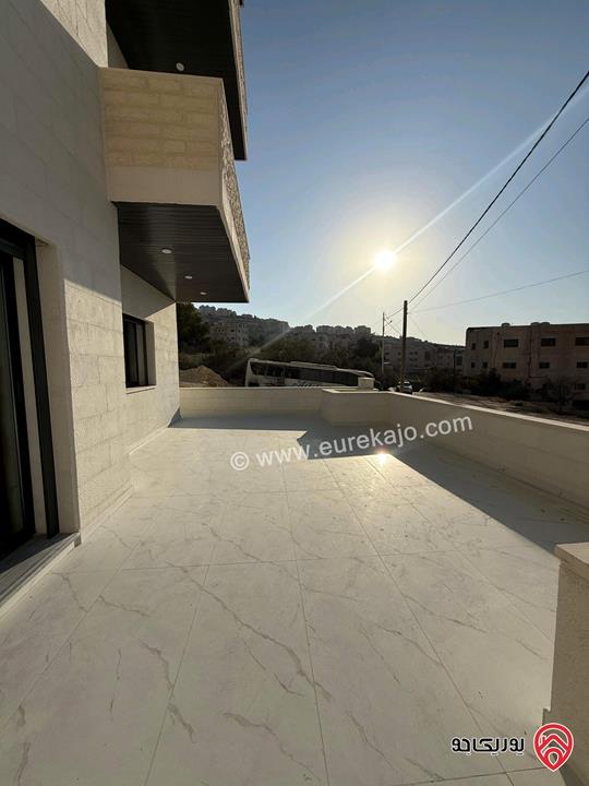 شقة أرضية ديلكوس مساحة 150م داخلي و 90م خارجي للبيع في عمان - الجبيهة الامام الغزالي
