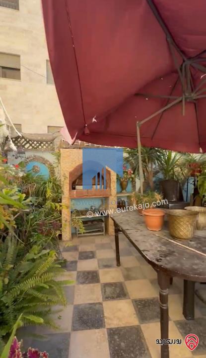 شقة شبه ارضية مساحة 205م مع حديقة وترسات 220م للبيع في عمان - تلاع العلي